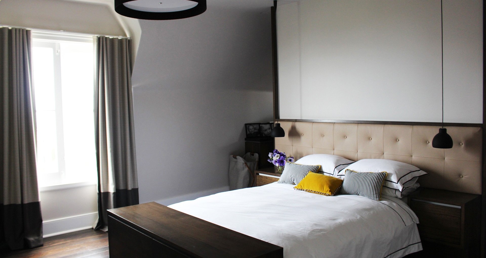 A refined, sunlit bedroom